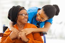 Happy elderly person with caregiver